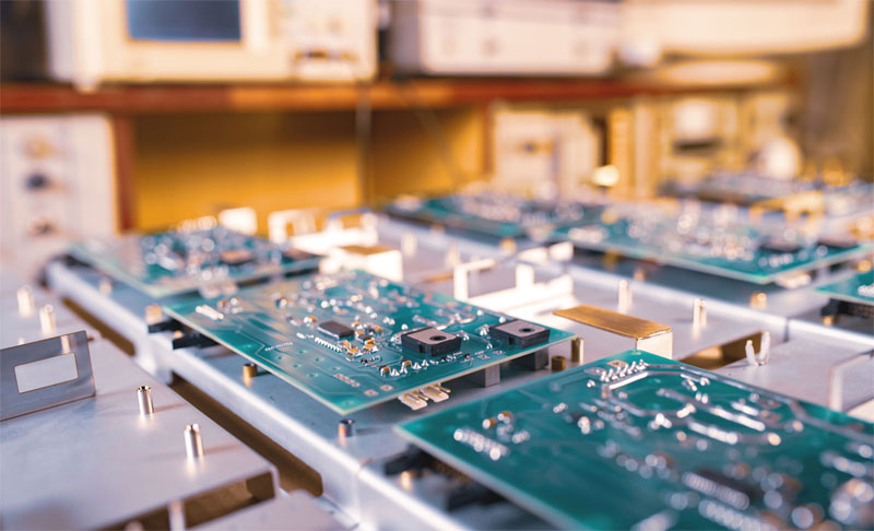 commercial Circuit boards laid out on table